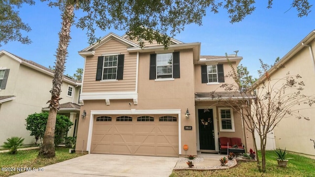 front of property with a garage