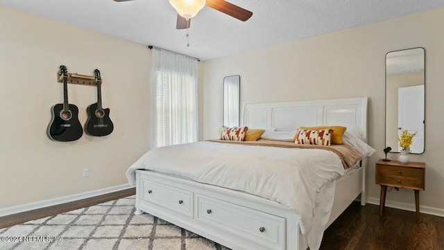 bedroom with hardwood / wood-style floors and ceiling fan