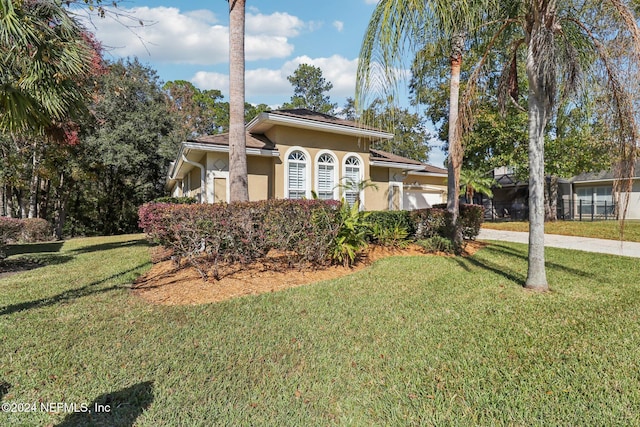 view of front of home with a front yard