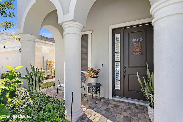 property entrance featuring a garage