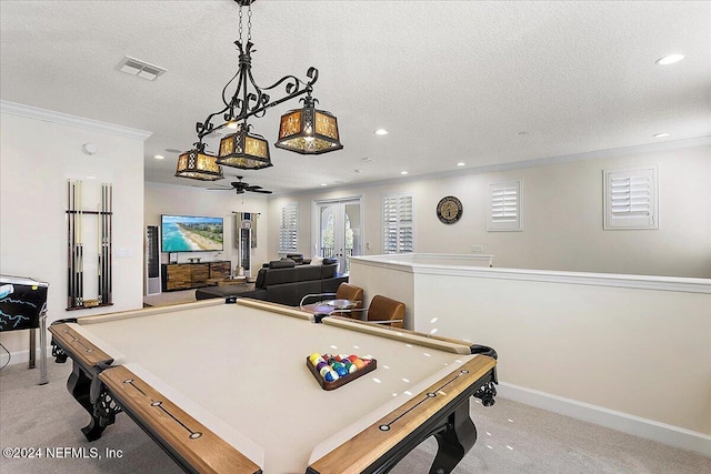 playroom with crown molding, light colored carpet, a textured ceiling, and pool table