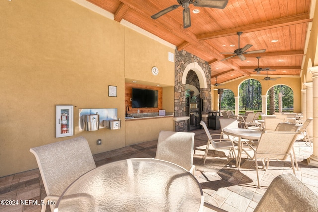 view of patio featuring ceiling fan