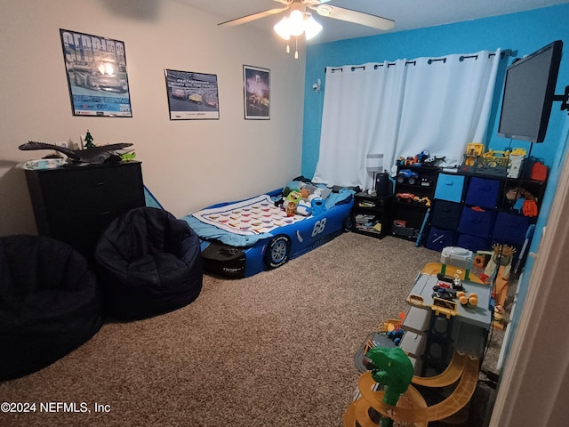 bedroom with carpet flooring and a ceiling fan