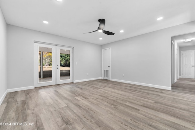 unfurnished room featuring ceiling fan, french doors, and light hardwood / wood-style floors