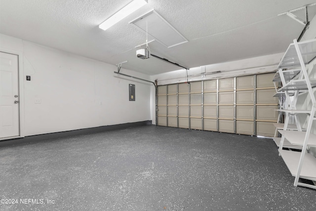 garage featuring electric panel and a garage door opener