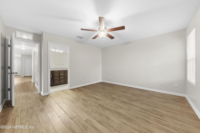 empty room featuring light hardwood / wood-style floors and ceiling fan