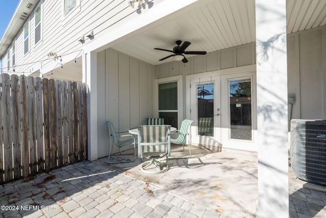 view of patio with central AC, ceiling fan, and french doors