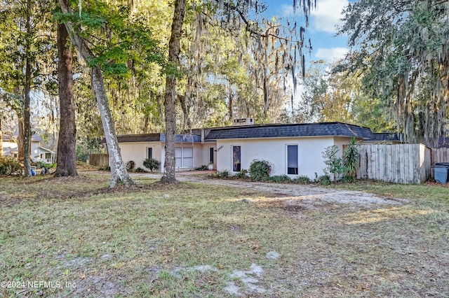 view of front of property with a front lawn