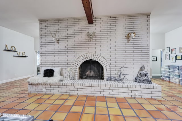 unfurnished living room with beamed ceiling, tile patterned flooring, and a fireplace