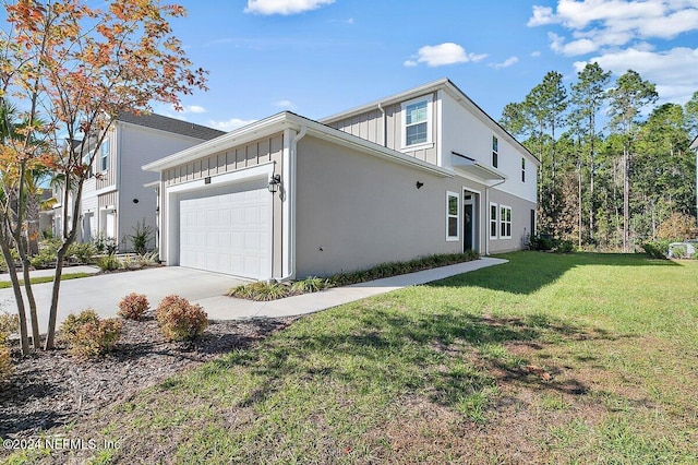 view of property exterior with a lawn and a garage