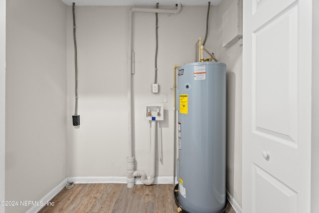 utility room with water heater