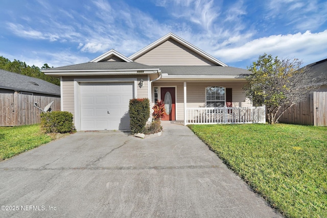 ranch-style house with a garage, covered porch, and a front yard