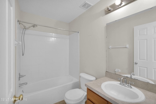 full bathroom with shower / bathtub combination, vanity, toilet, and a textured ceiling