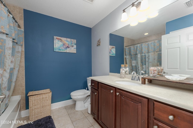 full bathroom featuring toilet, shower / bath combo, vanity, and tile patterned floors