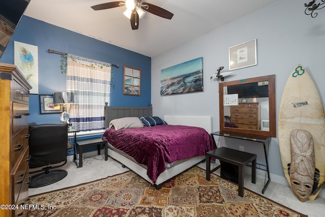 carpeted bedroom with ceiling fan