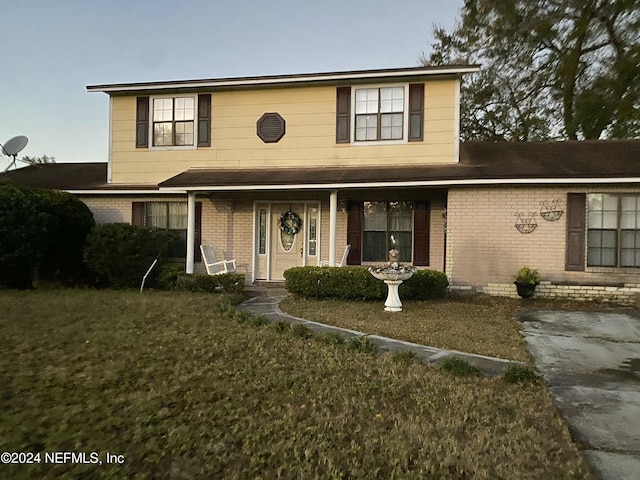 view of front property with a front yard