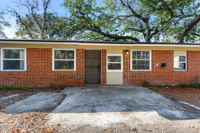 view of front of home with a patio