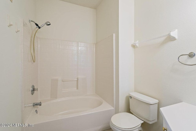 full bathroom featuring vanity, toilet, and washtub / shower combination