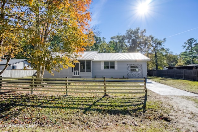 view of front of house with a front lawn