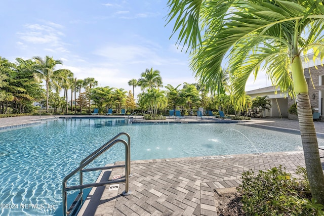 view of pool featuring a patio