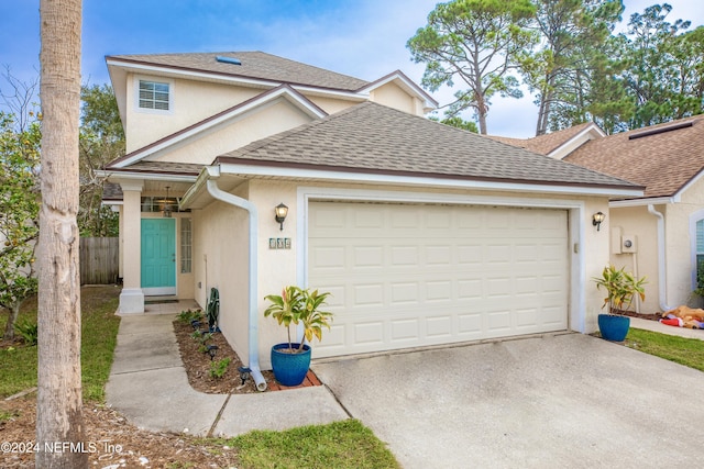 view of property featuring a garage