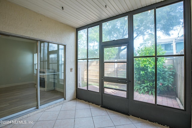 view of unfurnished sunroom