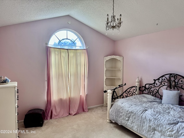 bedroom featuring light carpet, an inviting chandelier, and lofted ceiling