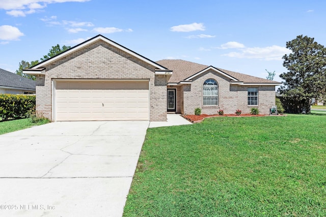 3130 Haverhill Ct, Green Cove Springs, FL 32043 - ranch-style home with a front lawn, concrete driveway, brick siding, and an attached garage