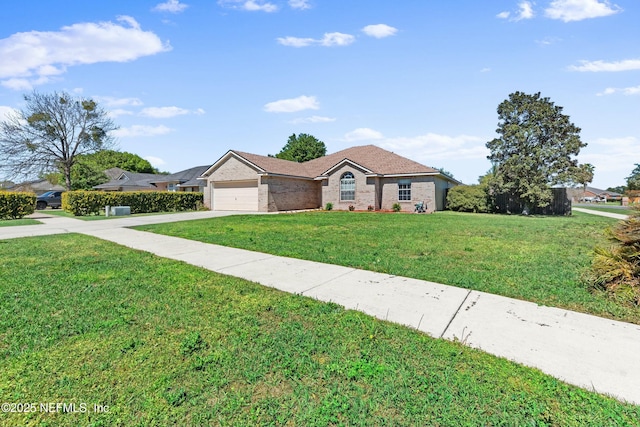3130 Haverhill Ct, Green Cove Springs, FL 32043 - view of front of home featuring an attached garage, concrete driveway, and a front yard