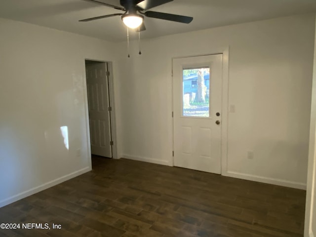 entrance foyer with ceiling fan and dark hardwood / wood-style flooring