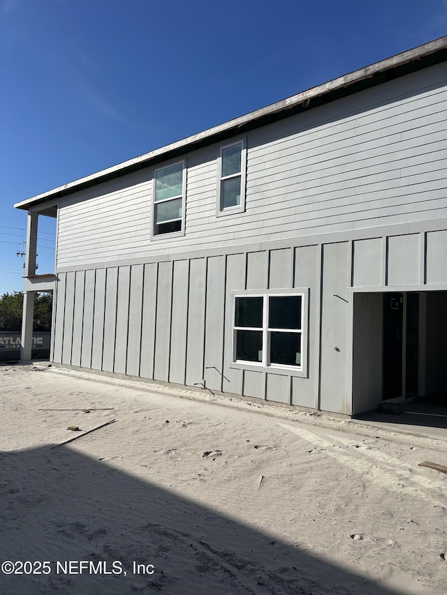 view of home's exterior with board and batten siding