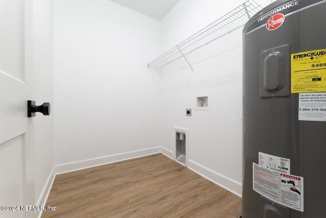 laundry area featuring hardwood / wood-style floors, washer hookup, hookup for an electric dryer, and water heater