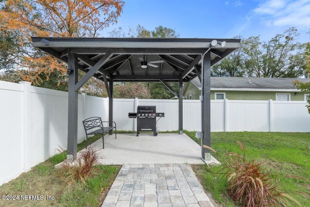 view of patio / terrace featuring a gazebo, area for grilling, and ceiling fan