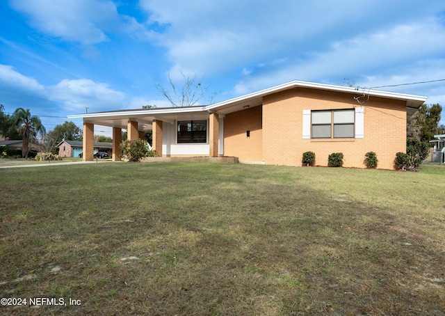 single story home with a front yard