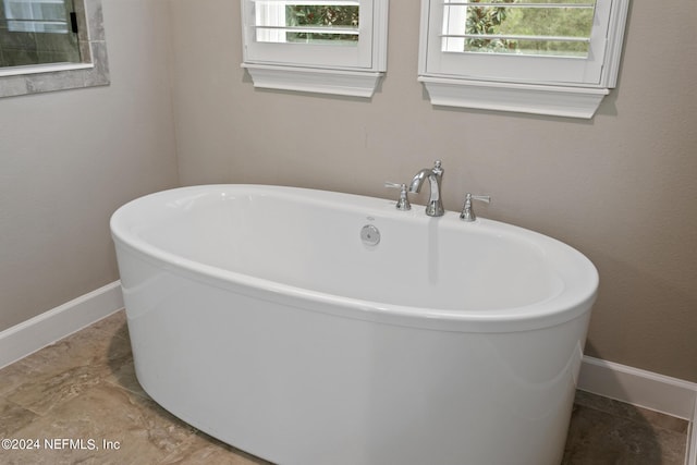 bathroom featuring a bathing tub