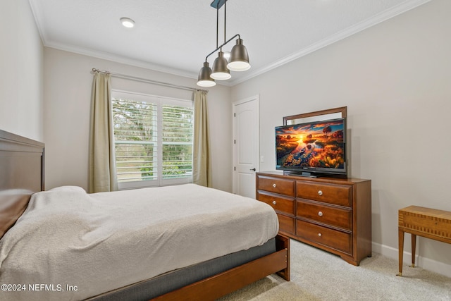 bedroom featuring crown molding and light colored carpet