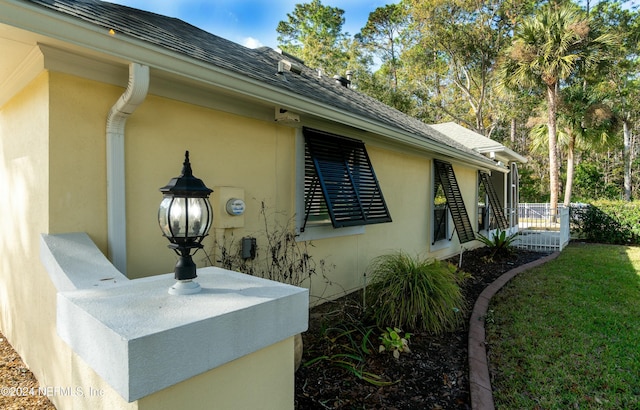 view of home's exterior featuring a lawn