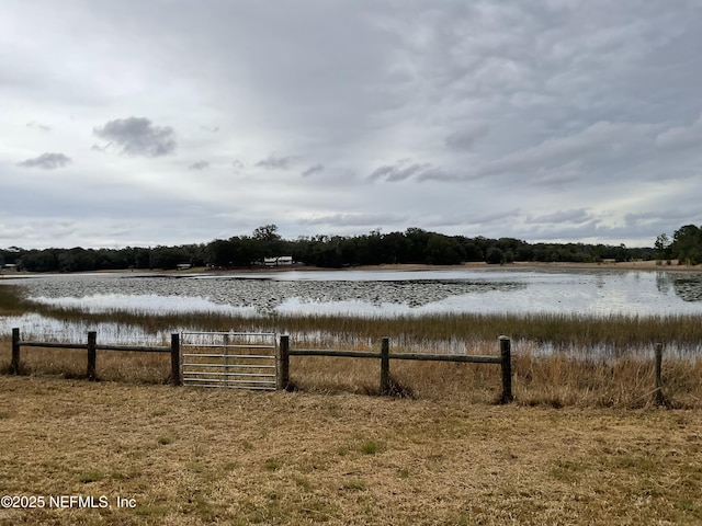 water view featuring fence