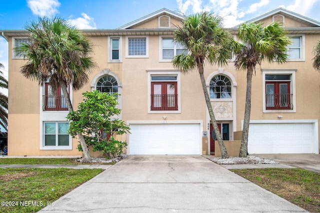 view of front of property with a garage