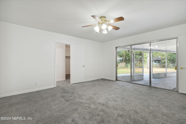 unfurnished room featuring carpet flooring and ceiling fan