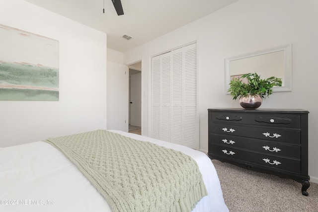 bedroom featuring carpet flooring, ceiling fan, and a closet