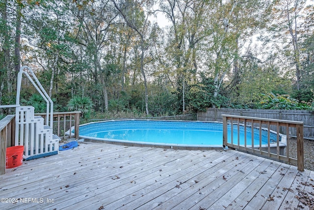 view of pool featuring a deck