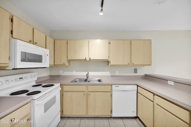 kitchen featuring sink, light brown cabinets, white appliances, and light tile patterned flooring