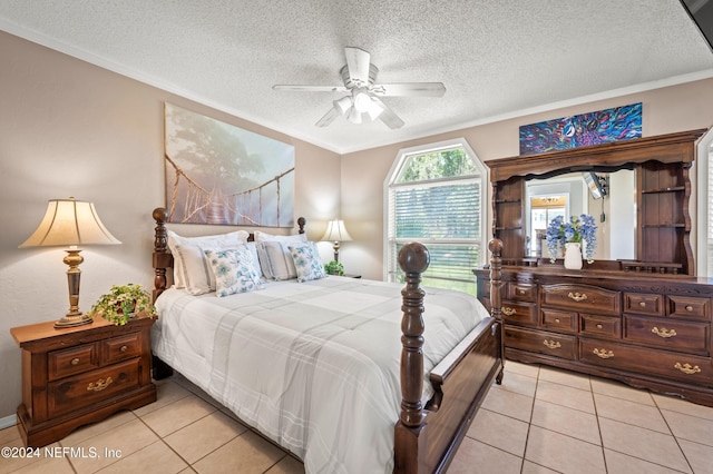 tiled bedroom with ceiling fan, ornamental molding, and a textured ceiling