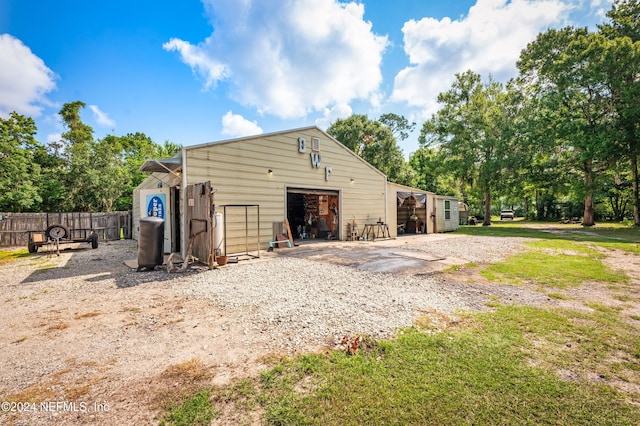 view of outbuilding featuring a garage