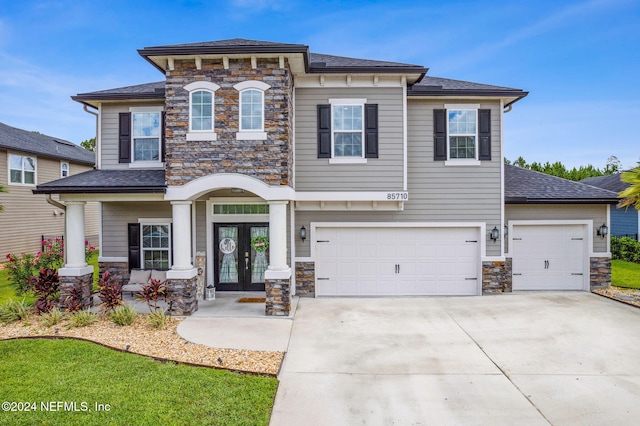 view of front of house featuring french doors and a garage