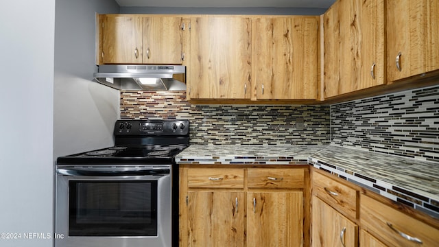 kitchen featuring stainless steel range with electric cooktop and tasteful backsplash