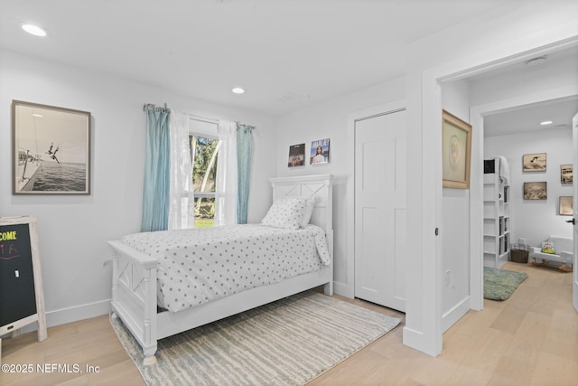 bedroom featuring light hardwood / wood-style floors