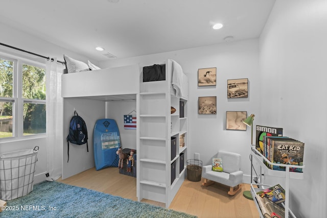 bedroom with light wood-type flooring