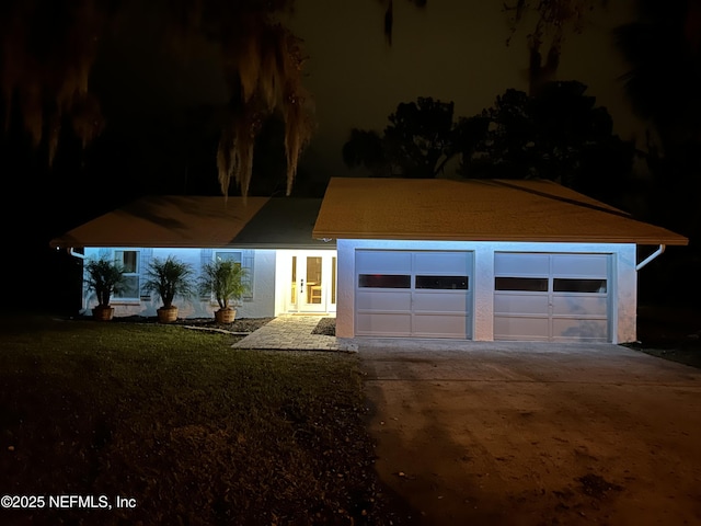 view of front of property with a garage